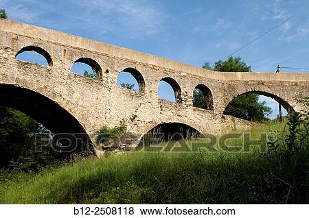 Bridge over the river Arre, Le Vigan, Gard, C? vennes, France View Large Photo Image Stock Photo - Bridge over the river Arre, Le Vigan, Gard, C? vennes, France. Fotosearch