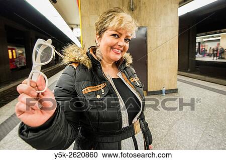Brussels, Belgium. Blonde Iranian woman waiting for her International train on Brussels Central Station. View Large Photo Image Stock Image - Brussels, Belgium. Blonde Iranian woman waiting for her International train on Brussels Central Station.. Fotosearch