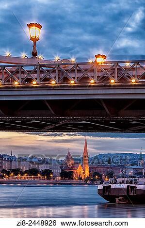 Stock Photograph - Buda Calvinist Church, Szechenyi Chain Bridge. river Danube at night, Budapest Hungary.. Fotosearch