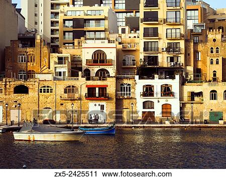 Buildings facing the harbour - St. Julian's - Malta. View Large Photo Image Stock Image - Buildings facing the harbour - St. Julian's - Malta.. Fotosearch