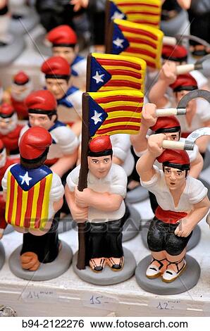 ? Caganers?, particular feature of modern nativity scenes at Santa Llucia Christmas fair, Barcelona. Catalonia, Spain. View Large Photo Image Stock Photograph - ? Caganers?, particular feature of modern nativity scenes at Santa Llucia Christmas fair, Barcelona. Catalonia, Spain.. Fotosearch