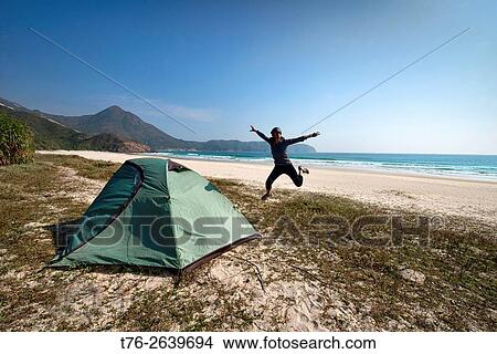 Camping on empty Tai Long Wan (Big Wave Bay) beach, Sai Kung, Hong Kong. View Large Photo Image Picture - Camping on empty Tai Long Wan (Big Wave Bay) beach, Sai Kung, Hong Kong.. Fotosearch