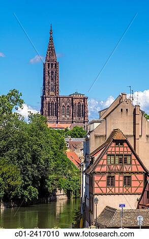 Stock Image - Cathedral and La Petite France houses Strasbourg Alsace France.. Fotosearch
