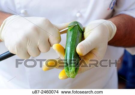 Picture - Chef Carving Courgette... Fotosearch