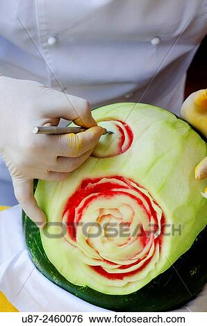 Chef Carving Watermelon.. View Large Photo Image Stock Photograph - Chef Carving Watermelon... Fotosearch