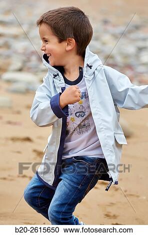 Child playing on the beach. Getaria. Gipuzkoa. Basque Country. Spain View Large Photo Image Stock Image - Child playing on the beach. Getaria. Gipuzkoa. Basque Country. Spain. Fotosearch