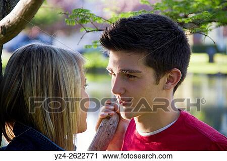 Closeup of a young couple outdoors. View Large Photo Image Stock Image - Closeup of a young couple outdoors.. Fotosearch