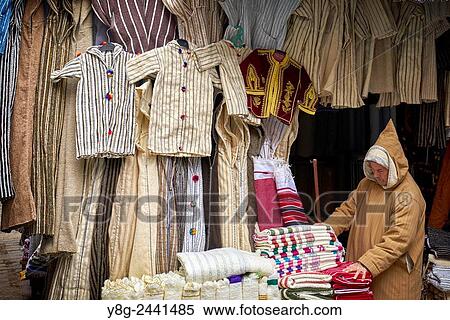 Stock Photography - Clothing shop. Wool djellabas, Berber Moroccan traditional dress. Morocco.. Fotosearch