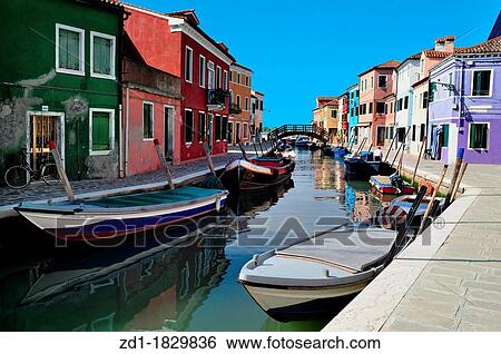 Stock Photograph - Colourfully painted houses on Burano island in the Venetian Lagoon, northern Italy. Fotosearch