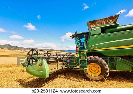 Combine cereal. Agricultural machinery Combine harvester on field of wheat? Learza? estate Near Estella, Navarre, Spain View Large Photo Image Picture - Combine cereal. Agricultural machinery Combine harvester on field of wheat? Learza? estate Near Estella, Navarre, Spain. Fotosearch