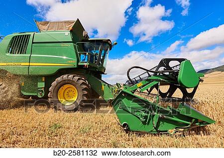 Combine cereal. Agricultural machinery Combine harvester on field of wheat? Learza? estate Near Estella, Navarre, Spain View Large Photo Image Stock Image - Combine cereal. Agricultural machinery Combine harvester on field of wheat? Learza? estate Near Estella, Navarre, Spain. Fotosearch