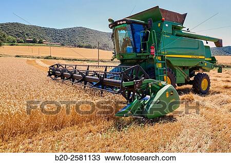 Combine cereal. Agricultural machinery Combine harvester on field of wheat? Learza? estate Near Estella, Navarre, Spain View Large Photo Image Stock Image - Combine cereal. Agricultural machinery Combine harvester on field of wheat? Learza? estate Near Estella, Navarre, Spain. Fotosearch