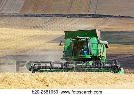 Combine cereal. Agricultural machinery Combine harvester on field of wheat? Learza? estate Near Estella, Navarre, Spain View Large Photo Image Stock Photo - Combine cereal. Agricultural machinery Combine harvester on field of wheat? Learza? estate Near Estella, Navarre, Spain. Fotosearch