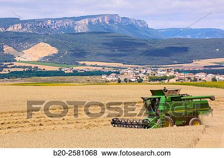 Combine cereal. Agricultural machinery Combine harvester on field of wheat? Learza? estate Near Estella, Navarre, Spain View Large Photo Image Stock Photo - Combine cereal. Agricultural machinery Combine harvester on field of wheat? Learza? estate Near Estella, Navarre, Spain. Fotosearch