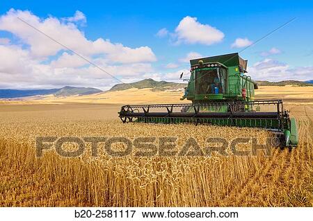 Combine cereal. Agricultural machinery Combine harvester on field of wheat? Learza? estate Near Estella, Navarre, Spain View Large Photo Image Stock Photo - Combine cereal. Agricultural machinery Combine harvester on field of wheat? Learza? estate Near Estella, Navarre, Spain. Fotosearch