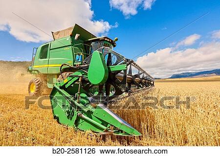 Combine cereal. Agricultural machinery Combine harvester on field of wheat? Learza? estate Near Estella, Navarre, Spain View Large Photo Image Stock Photograph - Combine cereal. Agricultural machinery Combine harvester on field of wheat? Learza? estate Near Estella, Navarre, Spain. Fotosearch