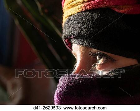 Stock Image - cool girl and Berber eyes headress.. Fotosearch