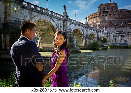Couple at Castel SantAngelo. Rome, Italy View Large Photo Image Stock Photography - Couple at Castel SantAngelo. Rome, Italy. Fotosearch
