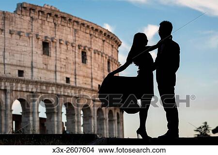 Couple at colosseum. Rome. Italy. View Large Photo Image Picture - Couple at colosseum. Rome. Italy.. Fotosearch