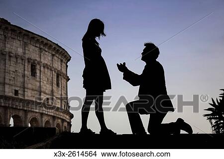 Couple at colosseum. Rome. Italy. View Large Photo Image Picture - Couple at colosseum. Rome. Italy.. Fotosearch