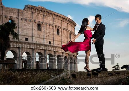 Couple at colosseum. Rome. Italy. View Large Photo Image Stock Image - Couple at colosseum. Rome. Italy.. Fotosearch