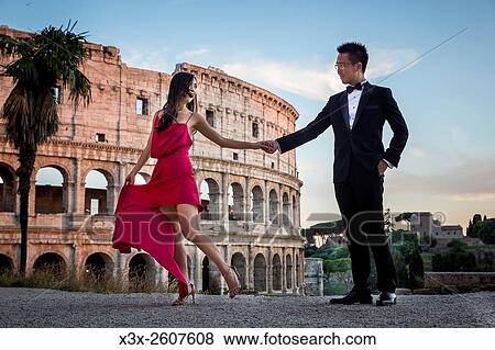 Couple at colosseum. Rome. Italy. View Large Photo Image Stock Photo - Couple at colosseum. Rome. Italy.. Fotosearch