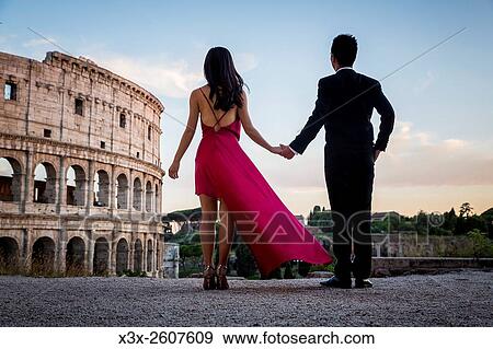 Couple at colosseum. Rome. Italy. View Large Photo Image Stock Photo - Couple at colosseum. Rome. Italy.. Fotosearch
