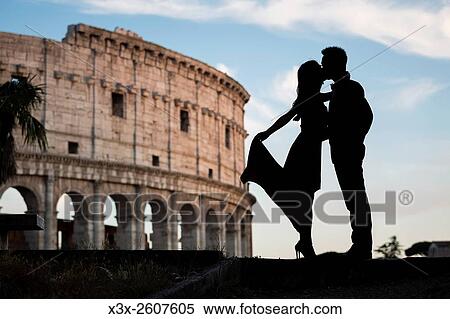 Couple at colosseum. Rome. Italy. View Large Photo Image Stock Photography - Couple at colosseum. Rome. Italy.. Fotosearch