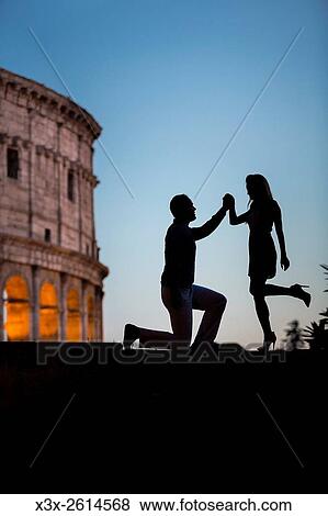 Couple at Roman Colosseum. Rome. Italy. View Large Photo Image Stock Photo - Couple at Roman Colosseum. Rome. Italy.. Fotosearch