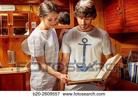 Couple inside a sailboat, galleon. Basque Country. Spain View Large Photo Image Stock Photo - Couple inside a sailboat, galleon. Basque Country. Spain. Fotosearch