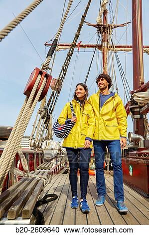 Couple outside a sailboat, galleon. Masts. Basque Country. Spain View Large Photo Image Stock Image - Couple outside a sailboat, galleon. Masts. Basque Country. Spain. Fotosearch