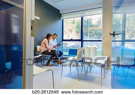 Couple. Waiting room, Hospital, Donostia, San Sebastian, Gipuzkoa, Basque Country, Spain View Large Photo Image Stock Photo - Couple. Waiting room, Hospital, Donostia, San Sebastian, Gipuzkoa, Basque Country, Spain. Fotosearch