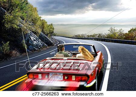 Stock Image - couples, TR6, road scene, landscape. Fotosearch