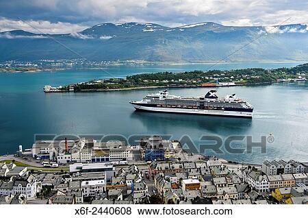 Cruiseliner Celebrity Celebration leaving the port of Alesund, Moere og Romsdal, Norway. View Large Photo Image Stock Photo - Cruiseliner Celebrity Celebration leaving the port of Alesund, Moere og Romsdal, Norway.. Fotosearch