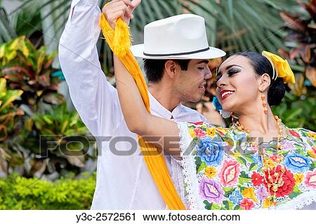 Dancing couple - Puerto Vallarta, Jalisco, Mexico. Xiutla Dancers - a folkloristic Mexican dance group in traditional costumes representing the culture and different regions of Mexico. View Large Photo Image Stock Image - Dancing couple - Puerto Vallarta, Jalisco, Mexico. Xiutla Dancers - a folkloristic Mexican dance group in traditional costumes representing the culture and different regions of Mexico.. Fotosearch