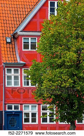 Denmark, Copenhagen, Facade of red building View Large Photo Image Stock Photo - Denmark, Copenhagen, Facade of red building. Fotosearch