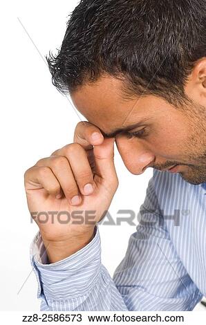 Depressed man hand on head against a white background. View Large Photo Image Stock Image - Depressed man hand on head against a white background.. Fotosearch