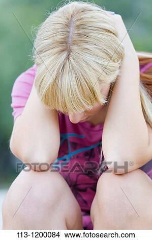 Picture - Desperate young woman. Fotosearch