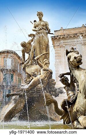 Diana fountain on the Archimede Square (Piazza Archimede), Ortigia, Syracuse (Siracusa, Syracuse), Sicily, Italy UNESCO. View Large Photo Image Stock Image - Diana fountain on the Archimede Square (Piazza Archimede), Ortigia, Syracuse (Siracusa, Syracuse), Sicily, Italy UNESCO.. Fotosearch