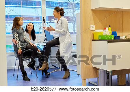 Doctor attending to patient medical consultation. Office. Plastic surgery. Pediatrician. View Large Photo Image Stock Photo - Doctor attending to patient medical consultation. Office. Plastic surgery. Pediatrician.. Fotosearch