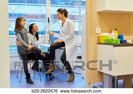 Doctor attending to patient medical consultation. Office. Plastic surgery. Pediatrician. View Large Photo Image Stock Photograph - Doctor attending to patient medical consultation. Office. Plastic surgery. Pediatrician.. Fotosearch