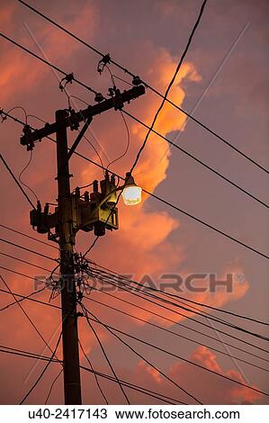 Electric wires at Sunset. View Large Photo Image Stock Image - Electric wires at Sunset.. Fotosearch