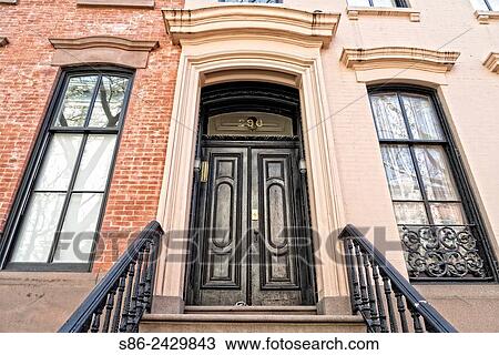 Elegant front entry double doors on a Greenwich Village, New York City, Federal Style Town House. View Large Photo Image Stock Image - Elegant front entry double doors on a Greenwich Village, New York City, Federal Style Town House.. Fotosearch