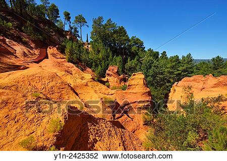 Eroded Mountain Hanging in the Ocher Breakage, Le Sentier des Ocres, Roussillon, Provence, Vaucluse, France. View Large Photo Image Stock Image - Eroded Mountain Hanging in the Ocher Breakage, Le Sentier des Ocres, Roussillon, Provence, Vaucluse, France.. Fotosearch