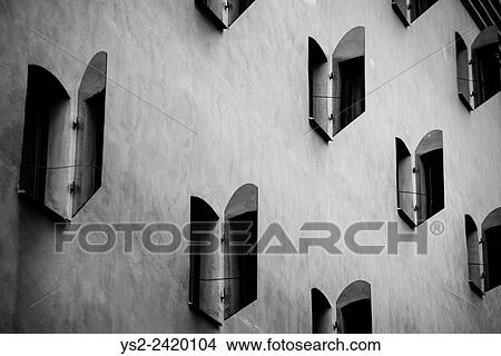 Facade of old building with metal window shutters in Gamla Stan (Old Town) Stockholm, Sweden. View Large Photo Image Picture - Facade of old building with metal window shutters in Gamla Stan (Old Town) Stockholm, Sweden.. Fotosearch