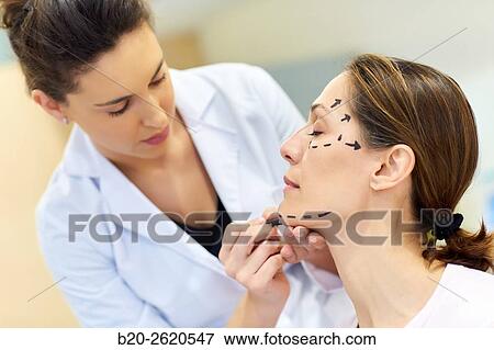 Facelift. Blepharoplasty. Rhytidoplasty. It involves stretching the facial skin in order to remove wrinkles. Before surgery it is necessary to mark the facial aesthetic units and choose the voltage vectors that apply in the intervention. Plastic surgery. View Large Photo Image Stock Photo - Facelift. Blepharoplasty. Rhytidoplasty. It involves stretching the facial skin in order to remove wrinkles. Before surgery it is necessary to mark the facial aesthetic units and choose the voltage vectors that apply in the intervention. Plastic surgery. . Fotosearch