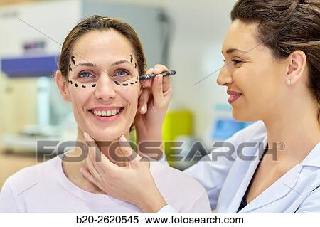 Facelift. Blepharoplasty. Rhytidoplasty. It involves stretching the facial skin in order to remove wrinkles. Before surgery it is necessary to mark the facial aesthetic units and choose the voltage vectors that apply in the intervention. Plastic surgery. View Large Photo Image Stock Photography - Facelift. Blepharoplasty. Rhytidoplasty. It involves stretching the facial skin in order to remove wrinkles. Before surgery it is necessary to mark the facial aesthetic units and choose the voltage vectors that apply in the intervention. Plastic surgery. . Fotosearch