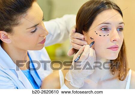 Facelift. Blepharoplasty. Surgery that aims to rejuvenate the look. It is to remove excess skin and bags of both eyelids and periocular tissue remodeling. Plastic surgery. Doctor attending to patient medical consultation. View Large Photo Image Stock Image - Facelift. Blepharoplasty. Surgery that aims to rejuvenate the look. It is to remove excess skin and bags of both eyelids and periocular tissue remodeling. Plastic surgery. Doctor attending to patient medical consultation.. Fotosearch