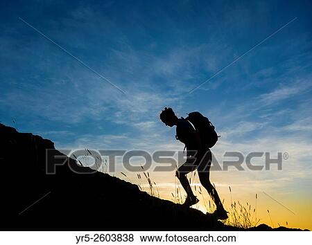 Female hiker on volcanic mountain overlooking Las Palmas city. La Isleta, Las Palmas, Gran Canaria, Canary Islands, Spain. View Large Photo Image Stock Photo - Female hiker on volcanic mountain overlooking Las Palmas city. La Isleta, Las Palmas, Gran Canaria, Canary Islands, Spain.. Fotosearch