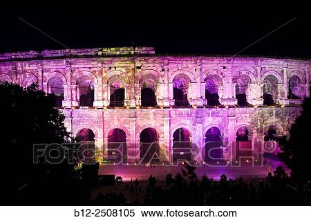 Fireworks and set of lights for the 14 july, arena of N? mes, Gard, France View Large Photo Image Stock Photography - Fireworks and set of lights for the 14 july, arena of N? mes, Gard, France. Fotosearch